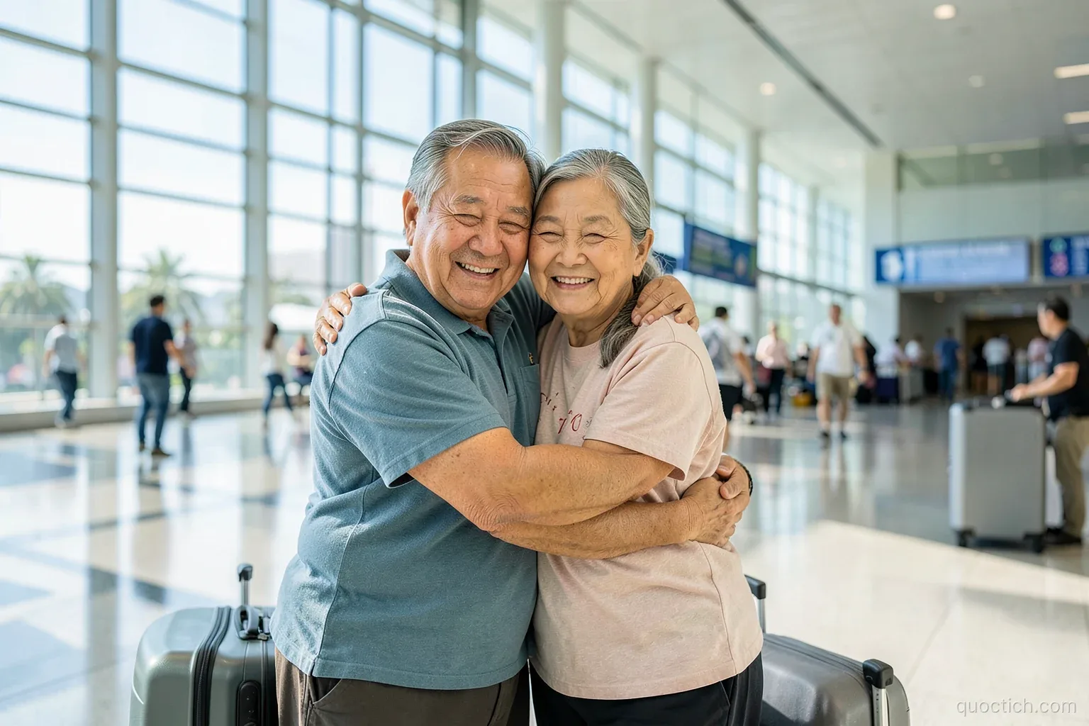 Vietnamese siblings in their fifties hugging warmly in the bright glass arrivals hall of Los Angeles International Airport, rolling suitcases beside them, midday light, medium shot